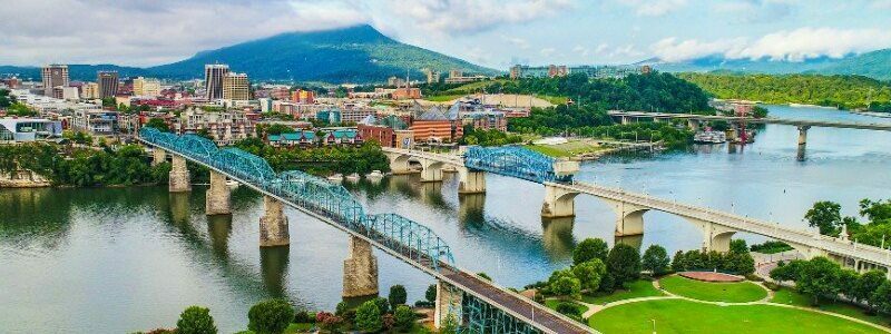 The city of Chattanooga, Tennessee, is encircled by water, offering a picturesque view of the cityscape.